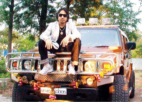 Mika Singh and his orange Hummer 