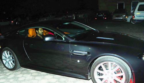 Ram Charan in his Aston Martin